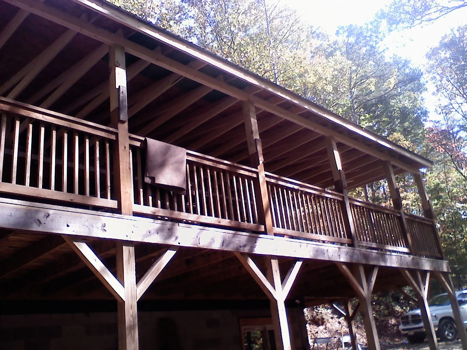 Timber framing under a new elevated porch and deck — Roof Leak Repair in Branchport by Roofing Brothers